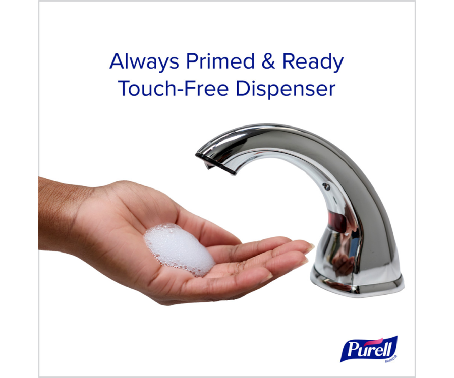 A hand receiving foam soap from a touch-free chrome dispenser against a white background. PURELL® CX10™ Chrome Counter Mount Soap Dispenser (12.5 in. x 10.375 in. x 5.25 in., 1/Case)